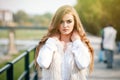 Close-up portrait of a beautiful young confident girl or businesswoman in a white suit with a beautiful make-up and hairdo on Royalty Free Stock Photo