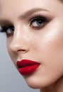 Close up portrait of a beautiful young model with bright evening make up, perfect skin. Royalty Free Stock Photo