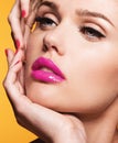 Close up portrait of Beautiful young model with pink lips and ma