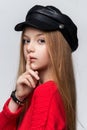 Close-up portrait of beautiful young redhead girl wearing red sw Royalty Free Stock Photo
