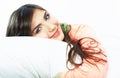 Close up portrait of beautiful young woman in bed. Smiling dre Royalty Free Stock Photo