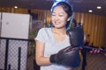 Smiling woman, boxing training