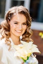 close-up. portrait of a beautiful bride with a bouquet of calla flowers