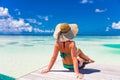 Close up portrait of beautiful young woman enjoying the sun at beach. Summer travel concept design. Summer beach vacation holiday Royalty Free Stock Photo