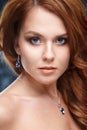 Close-up portrait of beautiful young woman with luxury jewelry and perfect make up Royalty Free Stock Photo