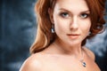 Close-up portrait of beautiful young woman with luxury jewelry and perfect make up Royalty Free Stock Photo