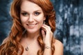 Close-up portrait of beautiful young woman with luxury jewelry and perfect make up Royalty Free Stock Photo