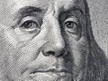 Closeup portrait Benjamin Franklin on 100 us dollar bill