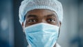 Close Up Portrait of a Black African American Handsome Male Doctor or Surgeon Wearing a Protective Royalty Free Stock Photo