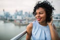 A close-up portrait of a woman standing on a terrace in London. Royalty Free Stock Photo