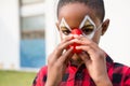 Close up portrait of boy wearing clown nose Royalty Free Stock Photo