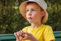 Close-up, portrait of boy who eats junk food, popcorn. Wrong eating habits of children Royalty Free Stock Photo