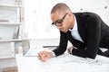 Close-up portrait of a businessman making notes at documents Royalty Free Stock Photo