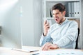 Close-up portrait of businessman in stress talking on phone Royalty Free Stock Photo