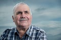 Close-up portrait of a Caucasian senior man with mustache Royalty Free Stock Photo