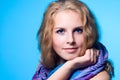 Close-up portrait of a charming girl with a scarf Royalty Free Stock Photo