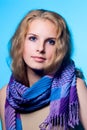 Close-up portrait of a charming girl with a scarf Royalty Free Stock Photo