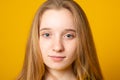 Close-up portrait of a cheerful girl. Studio portrait of a smiling teenage girl Royalty Free Stock Photo