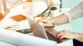 Close up portrait of civil engineer using laptop to planning pr