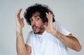 Close up portrait of concern shocked young man with frightened gestures. Scared facial expression Royalty Free Stock Photo