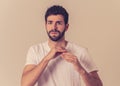 Close up portrait of concern shocked young man with frightened gestures. Scared facial expression Royalty Free Stock Photo