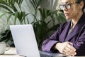 Close up portrait of confident serious business woman entrepreneur looking computer. Online business job difficulties. Royalty Free Stock Photo