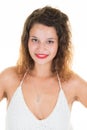 Close-up portrait of confident young woman curly hairs