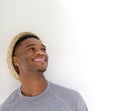 Close up portrait of a cool guy laughing with hat