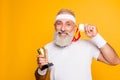 Close up portrait of crazy comic emotional cool grandpa holding