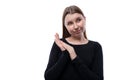 Close-up portrait of a cunning fair-haired 12 year old girl on a white background