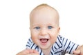 Close-up portrait of cute caucasian baby boy smiling and having fun with parents outdoors. Happy infant face with big blue eyes,sw Royalty Free Stock Photo