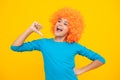 Close up portrait of the cute clown girl. Excited teenager, glad amazed and overjoyed emotions. Royalty Free Stock Photo