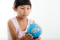 Close up Portrait of cute little girl holding earth Royalty Free Stock Photo