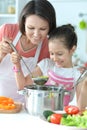 Close up portrait of cute little girl with mother Royalty Free Stock Photo