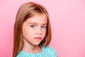 Close up portrait of cute nice lovely charming adorable beautiful confident concentrated little girl with big blue eyes, isolated