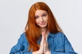 Close-up portrait cute and sincere hopeful redhead girl asking permission go party, holding hands in pray as talking to
