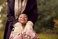 Close Up Portrait Of Daughter With Mother On Family Walk Through Autumn Countryside Together Royalty Free Stock Photo