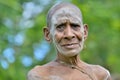 Close up Portrait of an elderly papuan woman from the tribe of Asmat.