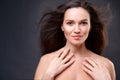 Close up portrait of elegant brunette woman with nude make up Royalty Free Stock Photo