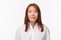 Close-up portrait of elegant young office lady, businesswoman in formal white collar shirt, smiling at camera pleasant Royalty Free Stock Photo