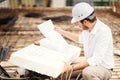 portrait of engineer reading plans on construction site Royalty Free Stock Photo