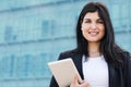 Close up portrait of a entrepeneur woman with a tablet