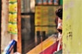 Close up portrait of the eye of an Indian shopkeeper