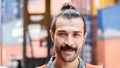 Close up portrait of face of middle aged man with a mustachio and beard with a smile and happy. Royalty Free Stock Photo
