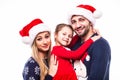 Close up portrait of father, mother and daugher on Christmas holiday Royalty Free Stock Photo