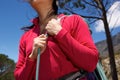 Close up female climber holding hank of rope outdoors