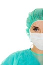 Close-up portrait of female surgeon doctor in mask