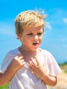 Close up portrait freckled blond boy artistic facial expressions, gestures, fatigue thirst anxiety annoyance confusion