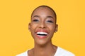 Close up portrait of friendly happy African American woman smiling