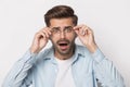 Close up portrait with frustrated handsome bearded man.